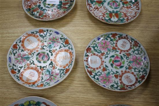 A near set of six 19th century Chinese famille rose saucer dishes, each painted with fruit and shou characters, diameter ranging 16.3cm